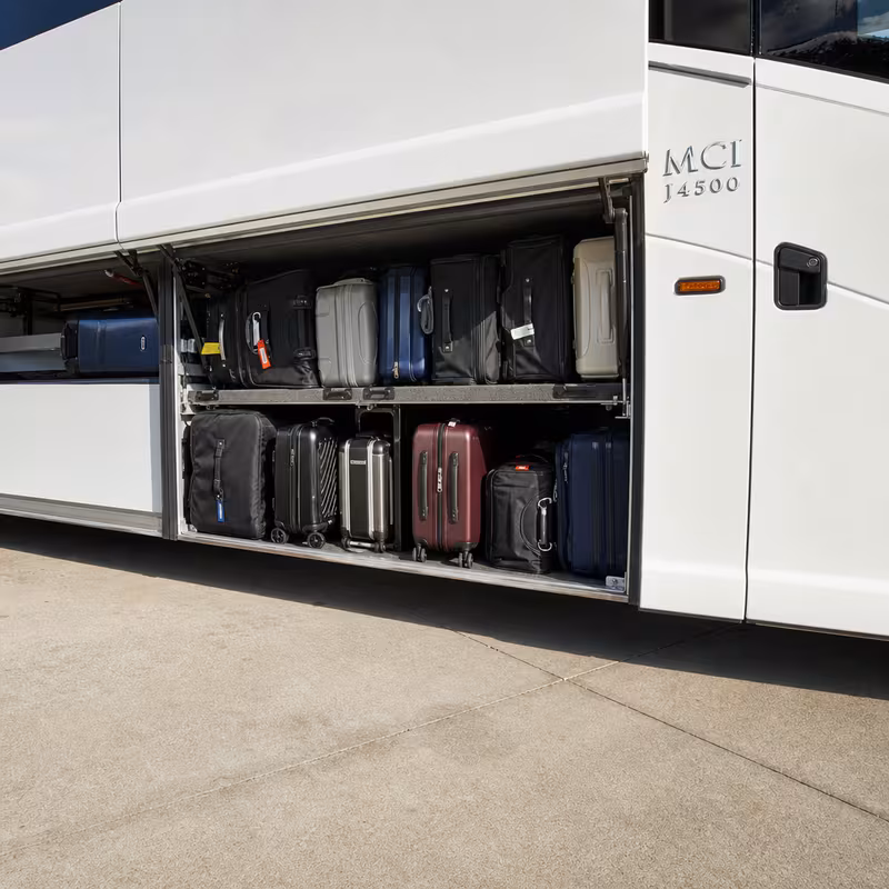 Party bus interior with wraparound leather seating and LED lighting in Dallas