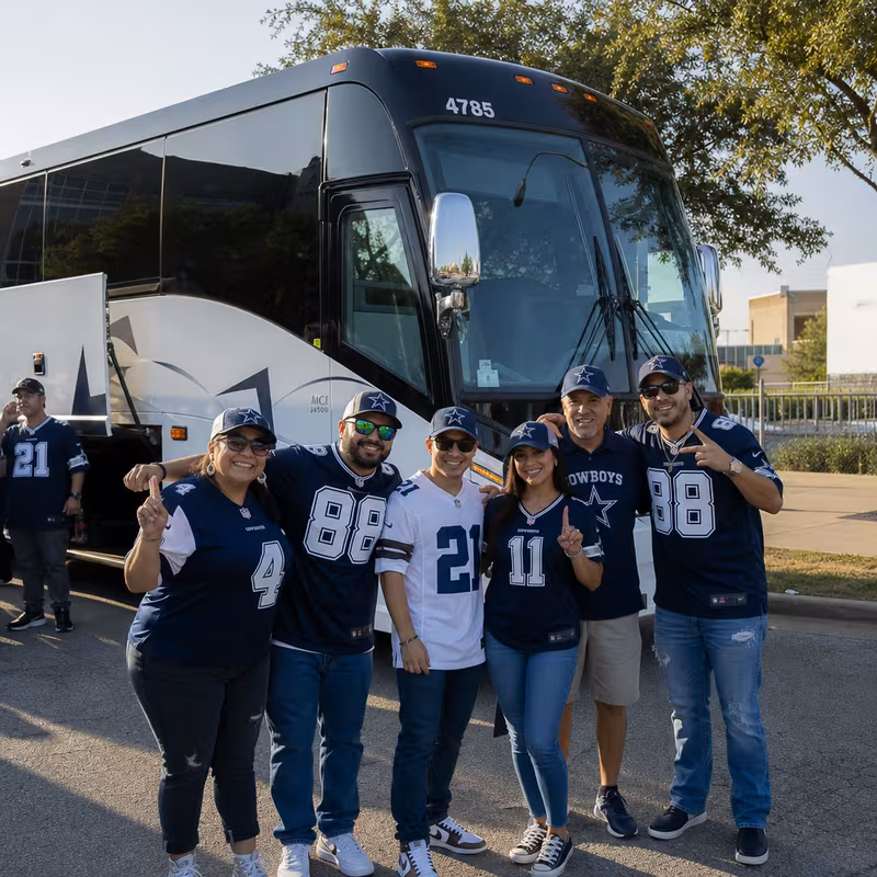 Passengers loading luggage while boarding an Dallas group shuttle