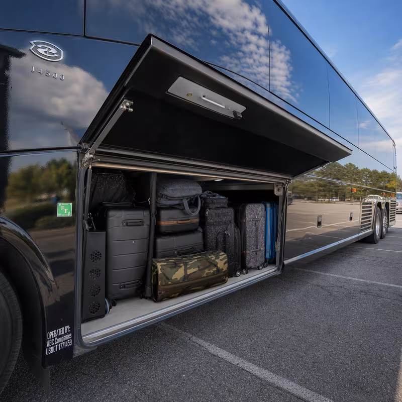 Party bus interior with wraparound leather seating and LED lighting in Dallas
